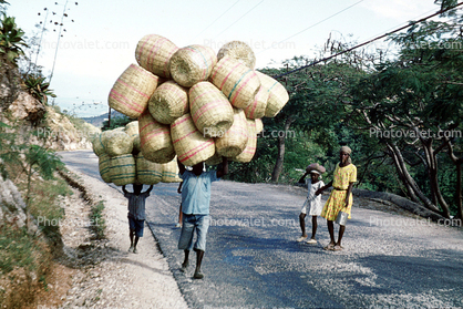 Man and Boy carrying baskets, overload, Haiti