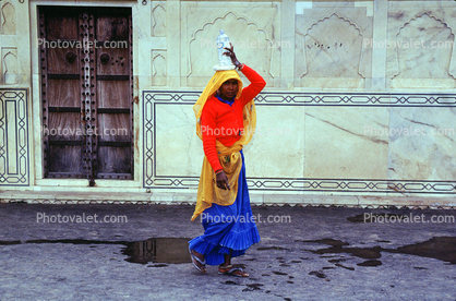 Woman Carrying a Bottle on her Head, Jaipur, Rajastan, India