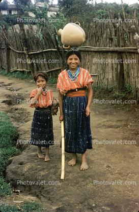 Woman, girl, smiling, native costume, dress, barefeet, barefoot, path, October 1962