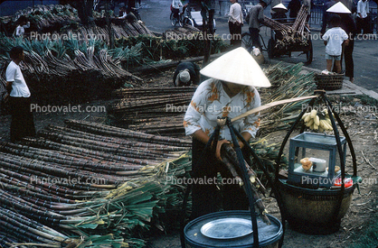 Bamboo Street Vendors, bananas, hat, Saigon, October 1962, 1960s