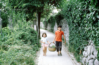 girl and boy carrying a basket, path, Ivy