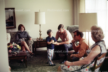 Lamps, couches, people, boy, June 1972, 1970s