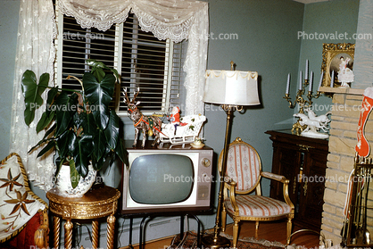 Television, chair, curtains, 1950s