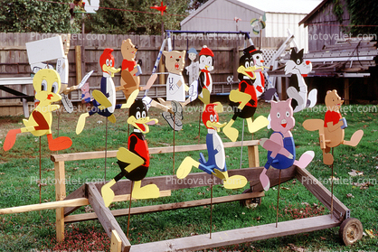 Garden, Tweety, Woody Woodpecker, Daffy Duck, Sylvester, pig, bear, Chilly Willy, Pooh Bear