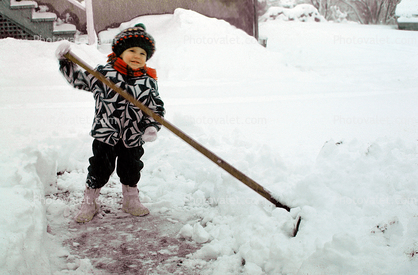 Girl with a Snow Shovel, clearing snow, 1950s