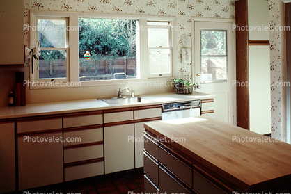 Kitchen sink, island, counters, window