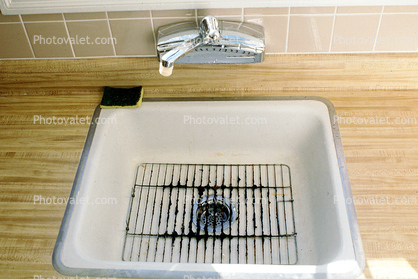 Kitchen sink, sponge, faucet, drain