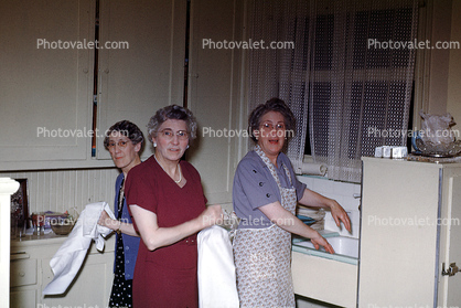 Women washing the dishes, dishwashers, housewives, apron, smiles, 1940s