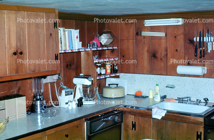 Kitchen Counter, Electric Mixer, Sink, Cabinets, Bare Fluorescent Light, July 1970