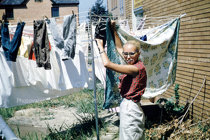 Hanging clothes, drying, sunny day, Clothes Line, Puerto Rico, 1950s