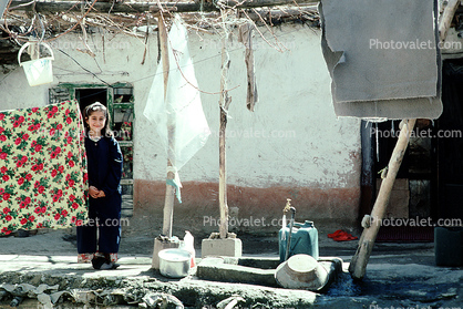 girl hanging laundry, Hazar Hani, Iran