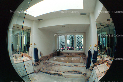bathtub, mirror, marble, skylight