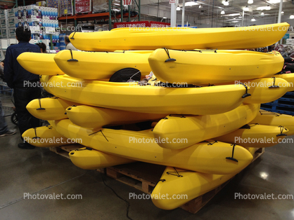 stacked banana kayaks