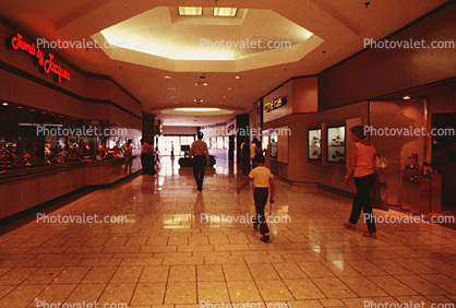 Mall Shoppers, Shopping Mall, interior, inside, tile floor, 1980s, Jewelery by Jacques