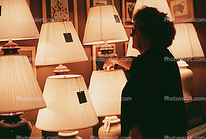 Woman at a Lighting Store, interior, inside, indoors, lampshade