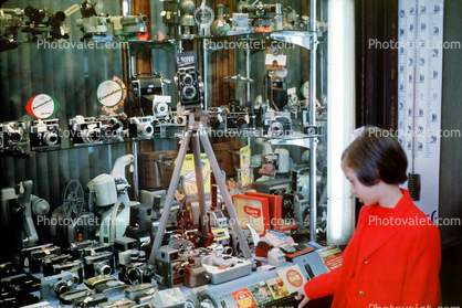 Camera Store, window display, girl, tripod, Rollei, 1960s