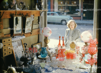 Woman Window Shopping, glass, lamps, decanters, 1940s