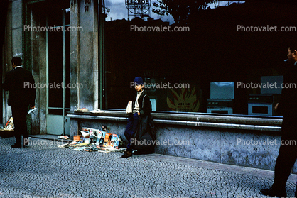 Boy Seller, Cobblestone Sidewalk, Lisbon Portugal