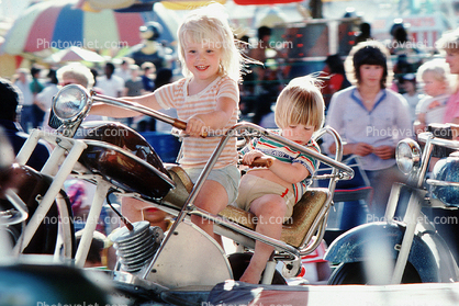 Smiling Girl, boy, motorcycle ride, County Fair