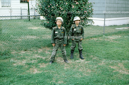 Two Army soldiers, Boys, boots, helmets, uniform