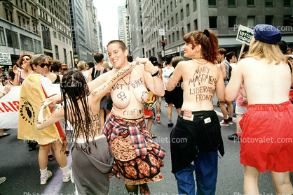 Topless Women marching, summer, Manhattan, Lesbian Gay Freedom Day Parade