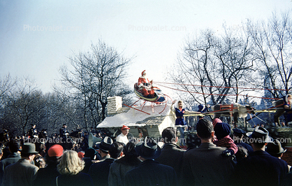 Santa Claus on a Sleigh, on a House, float, 1950s