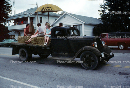 Flatbed Truck, hay bales, women, Sulfer Springs Sesquicentennial Parade, Tiro-Auburn, Ohio, July 1983, 1980s