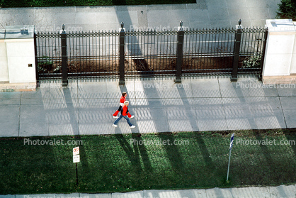 boys walking, shadow, fence, Salt Lake City