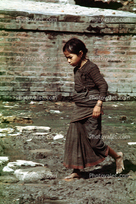 Girl Walking, Sari, mud