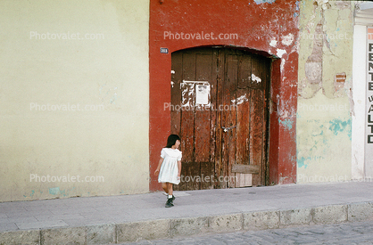Sidewalk, girl, door, doorway, curb, wall