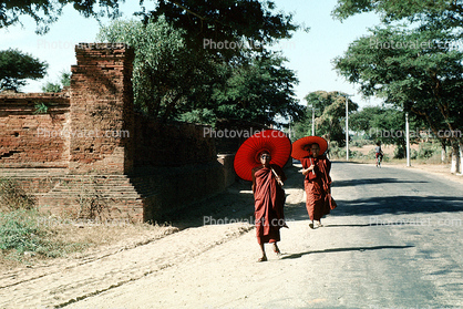Monks Walking down the street, Bagan, Myanmar