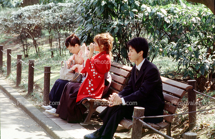 Man, Women, sitting on a bench