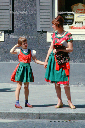 girl, female, costume dress, sidewalk, building, 1963, 1960s