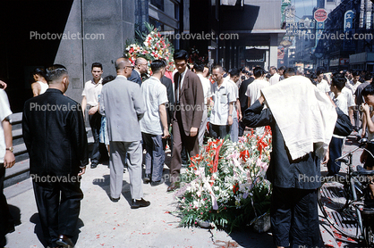Men, flowers, walking, September 1962, 1960s