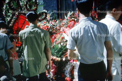 Men, flowers, walking, September 1962, 1960s