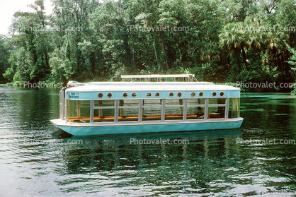 Boat on the water, trees, park, 1973