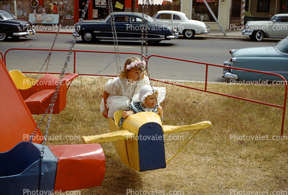 Flying on a Ride, Fair, Cars, 1950s