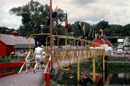 Bridge, River, buildings, flags, Circus Museum, Baraboo Wisconsin, July 1964, 1960s