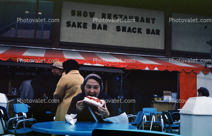 Woman Eating a Cake, Restaurant