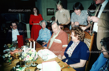 Men, Women, chairs, cake, candles, table, March 1983, 1980s