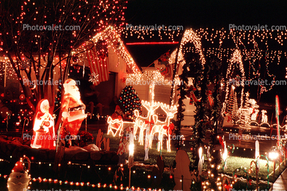 Santa Claus, reindeer, storybook scene, Christmas Lights, decoration, frontyard, house, home, Nipomo
