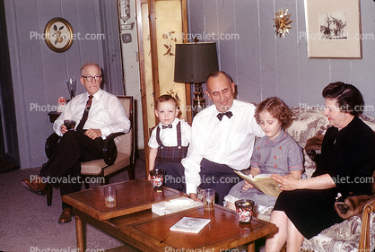 Family, Reading, Mom, Dad, Bowtie, Grandpa, son, sofa, daughter, reading,  1940s, 1940s