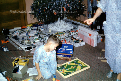 toy train, boy, pajamas, robe, tree, presents, board Game, Baseball game, nightwear, 1950s