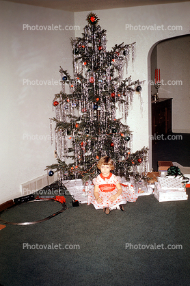 Decorated Tree, Girl, toy train, 1950s