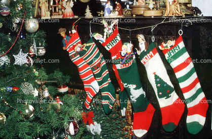 stuffed stockings, Mary, John, Mom, Jari, Dad, Tree, 1950s