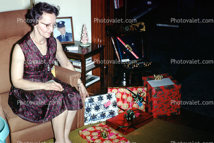 Woman, presents, 1960s
