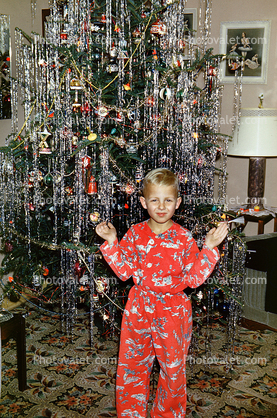 Boy in Pajama, decorated tree, 1950s