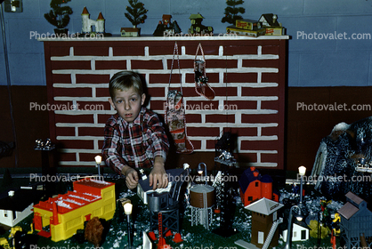Boy with Many Presents, toys, fireplace, 1950s