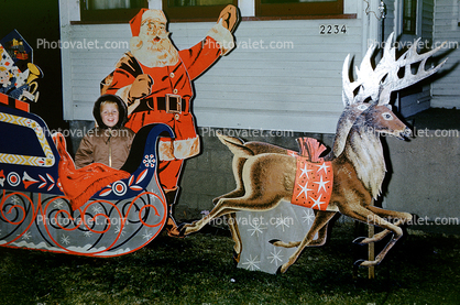 Boy, Santa Clause Sleigh scene, 1950s