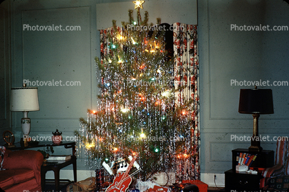 Decorated Christmas Tree, lamps, violin, 1950s